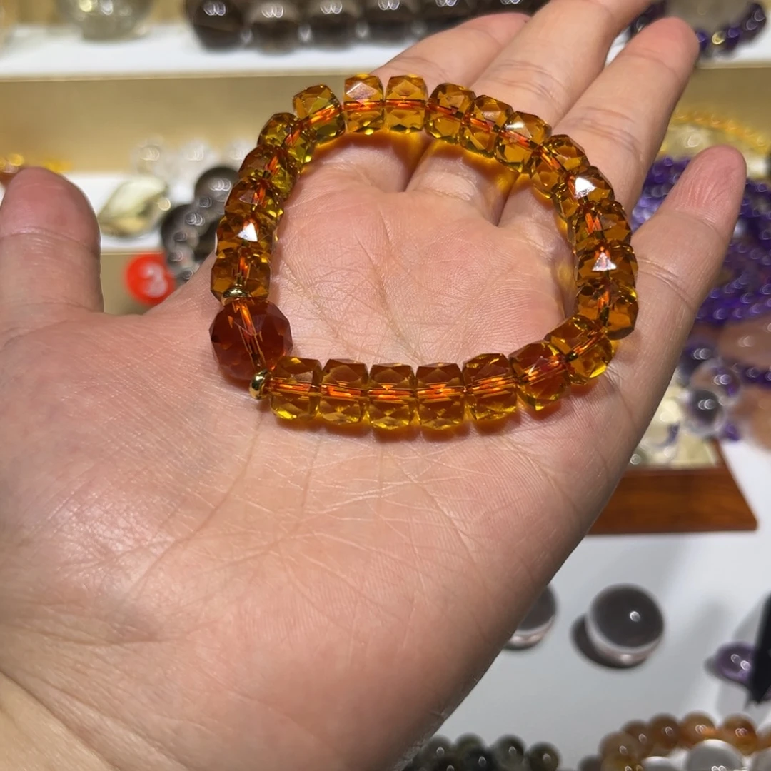 喵****非金属切面巴西暴力黄手串