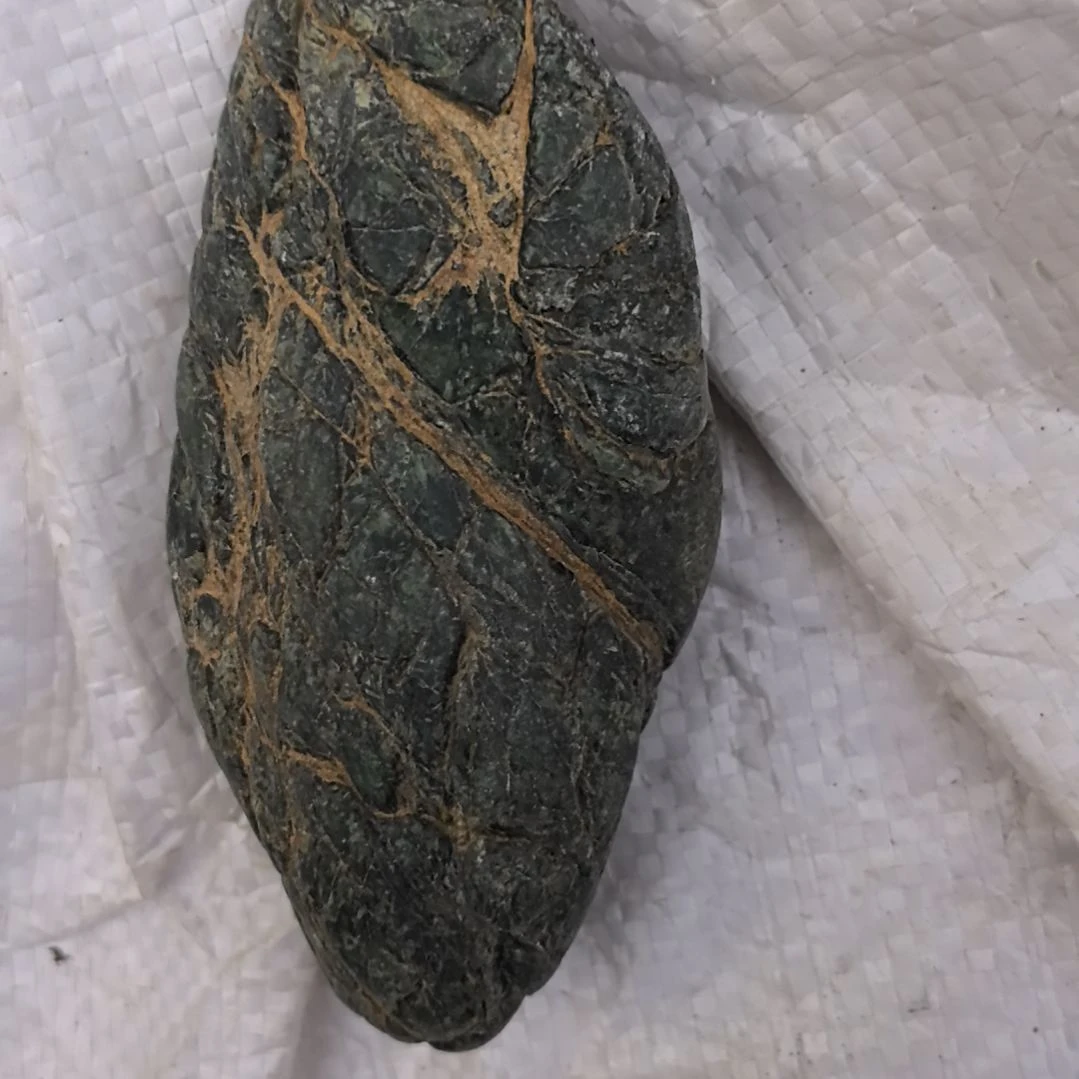 石***金有机玻璃藏玉药王石原石一个