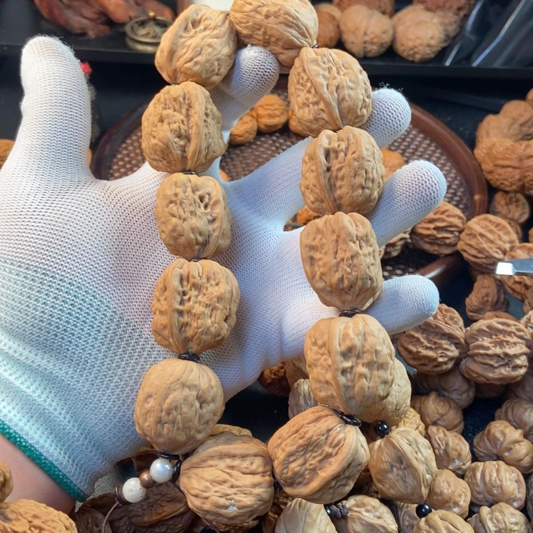 桃核手串瑞**具金蝉核桃