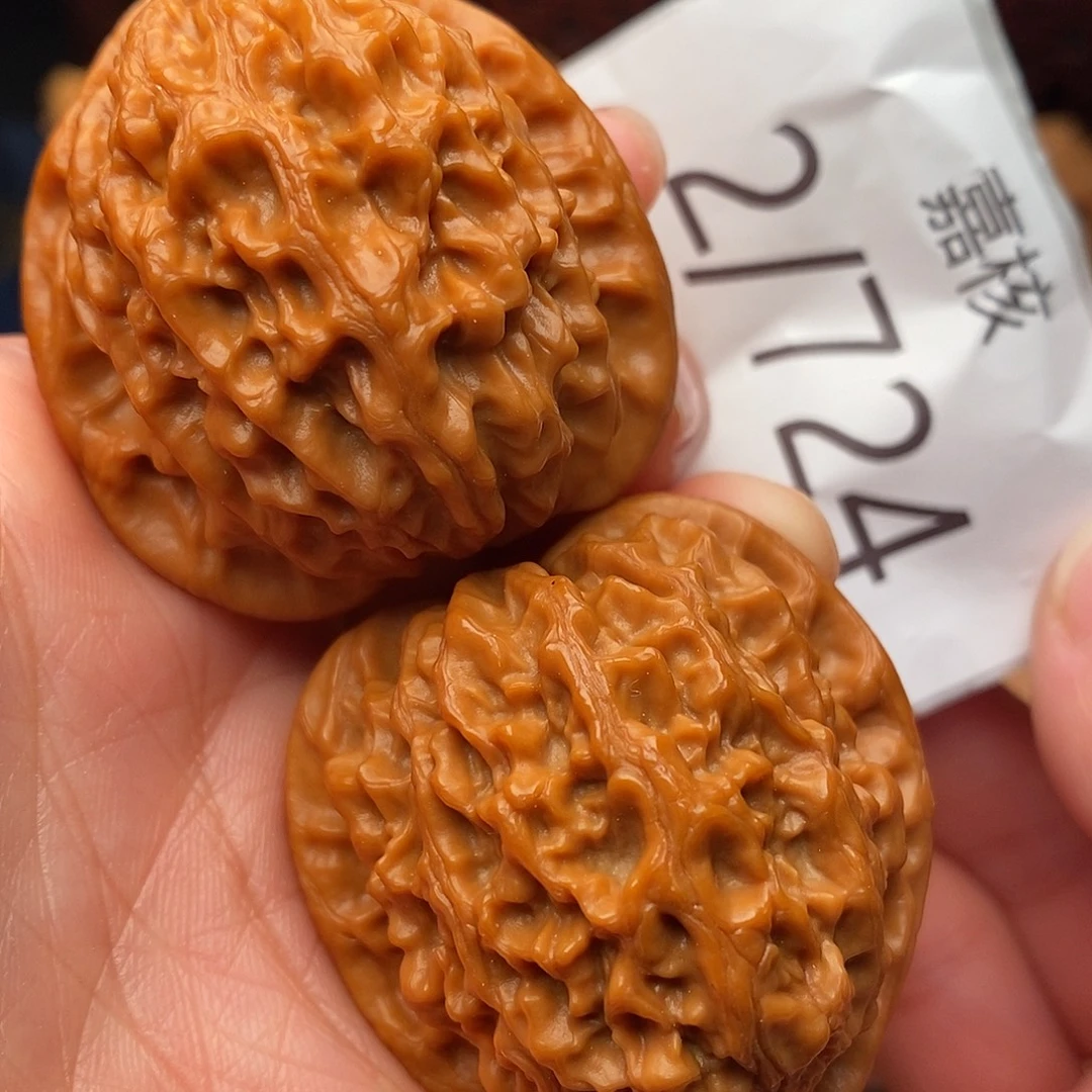 文玩核桃把件40金牛