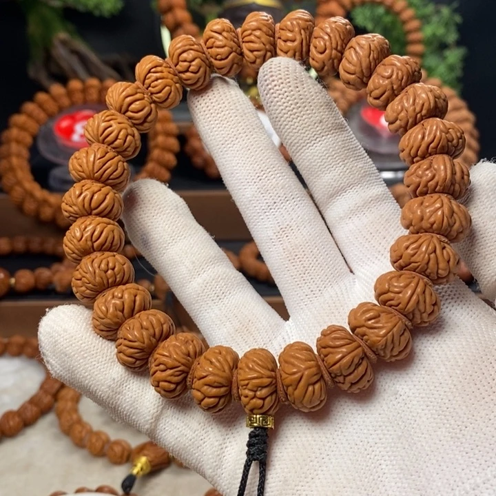 桃核吊坠五*。秦岭龙纹