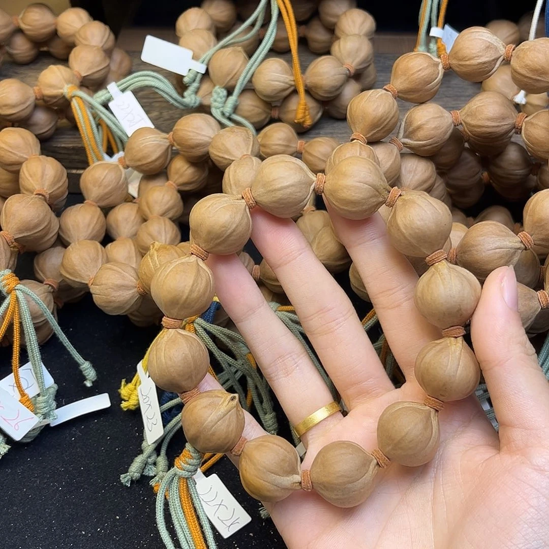 浮***闲橄榄核手串005 21×23