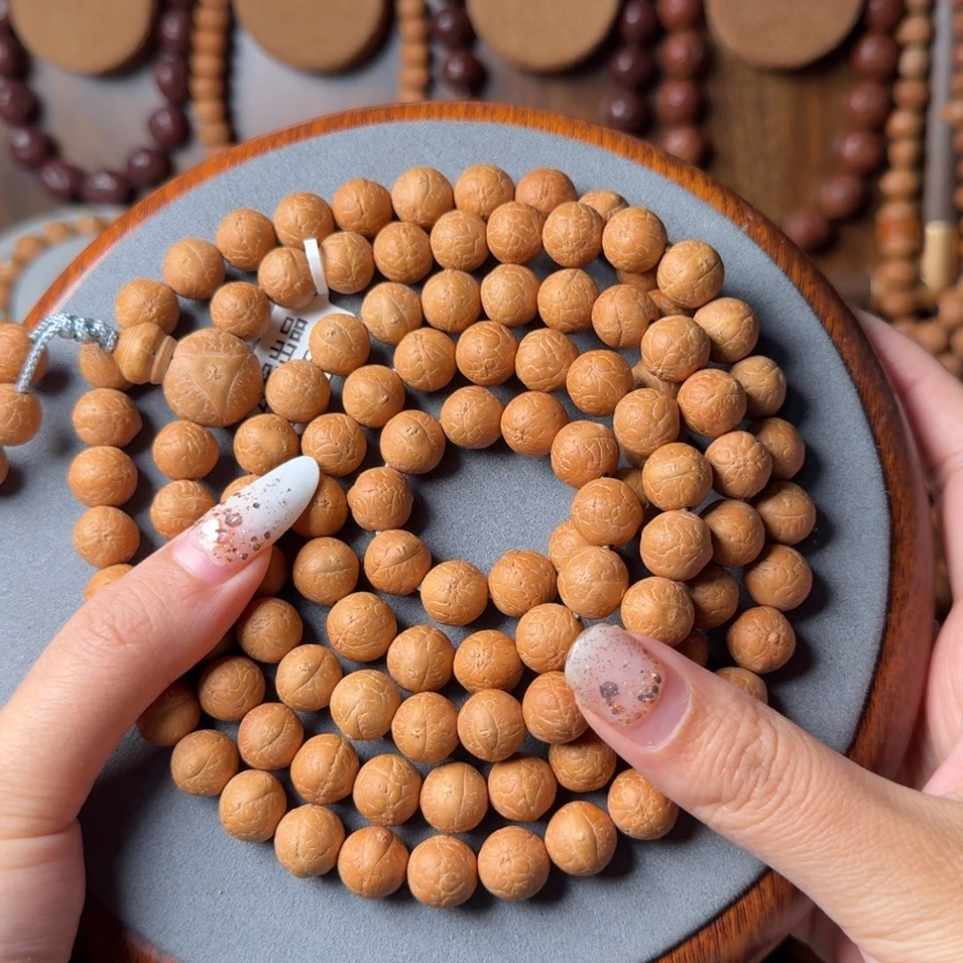 凤眼菩提把件11mm/长串108+6颗/正圆奶油皮