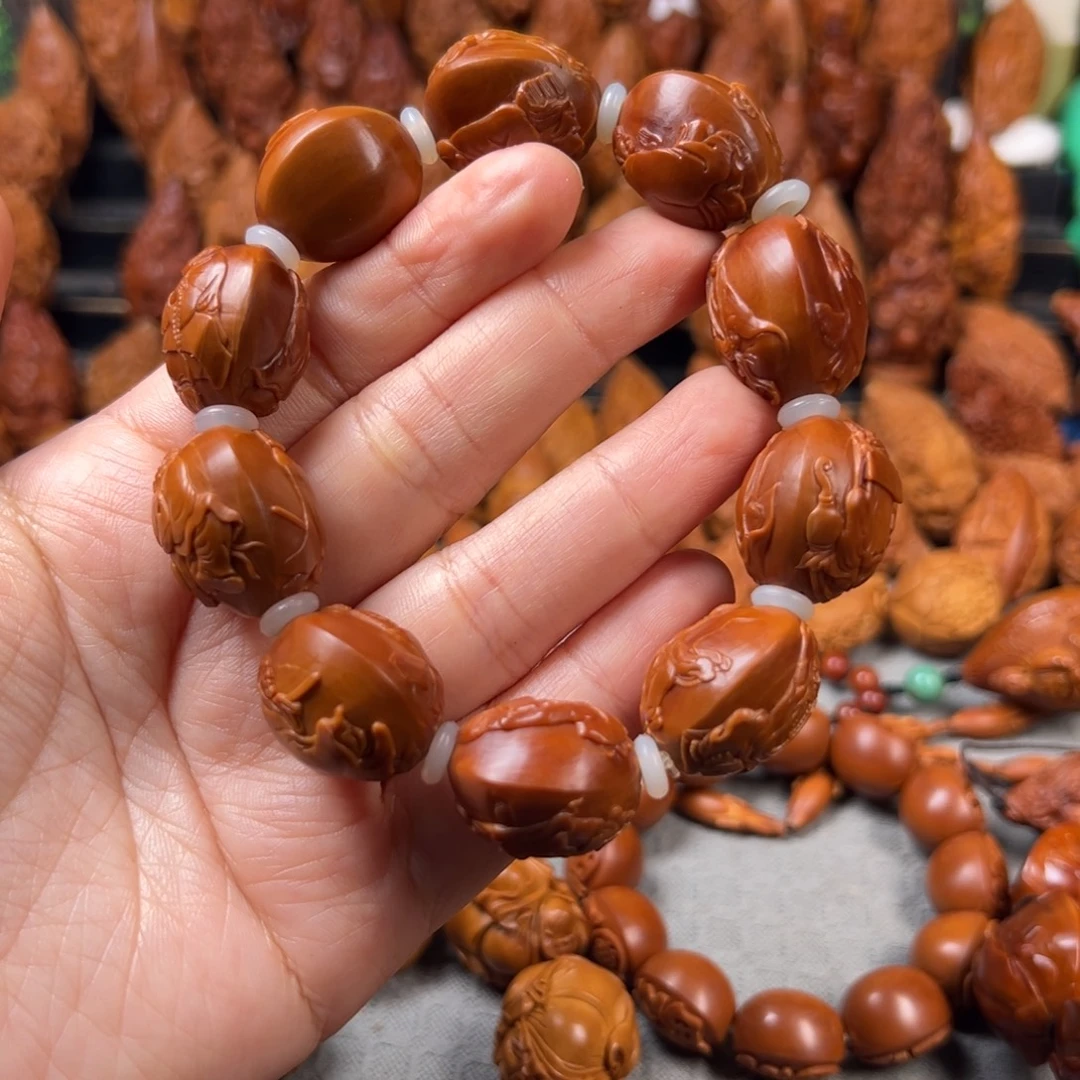卫***东手串/手链橄榄核核雕