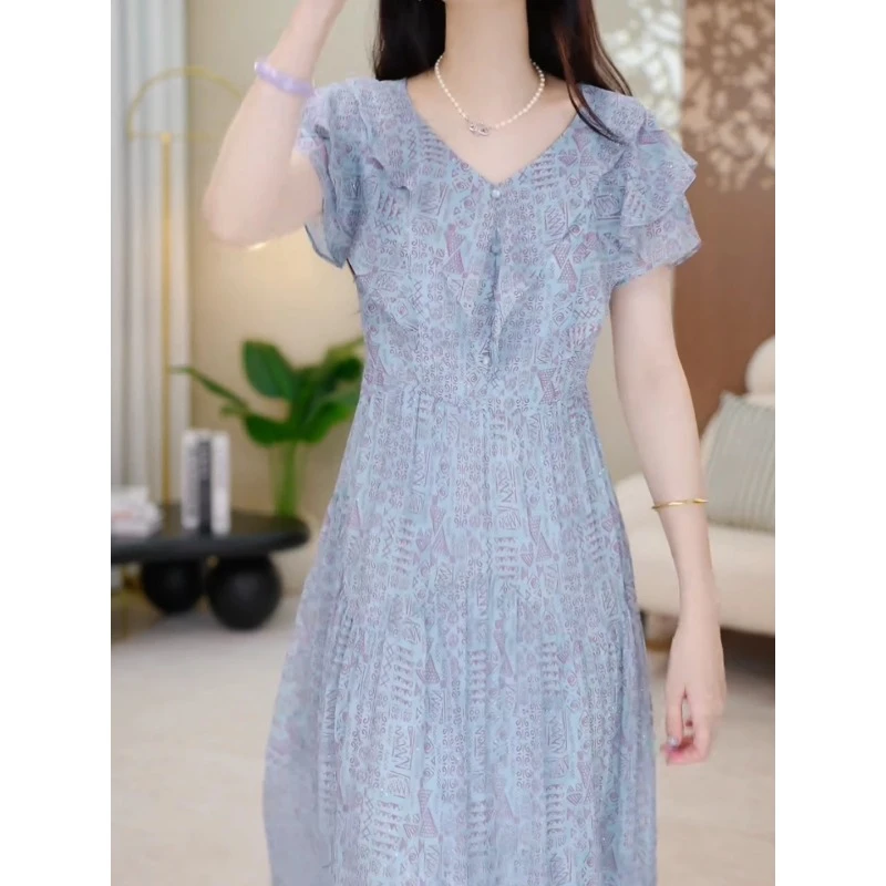 沐阳轻奢高档气质碎花连衣裙2025夏季新款遮肚修身显瘦中长款裙子