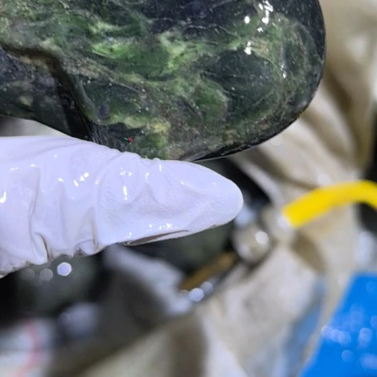 旭***颜木藏玉药王石原石一个