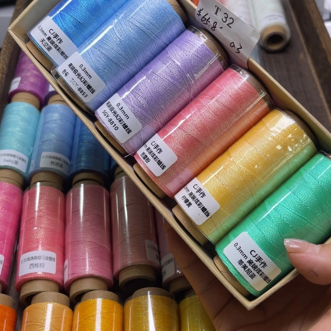 淼***.腈纶0.3幻彩蜡6卷T32