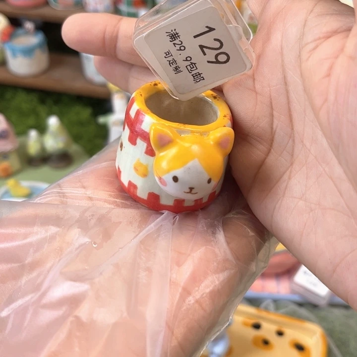 129猫咪拇指花盆手绘
