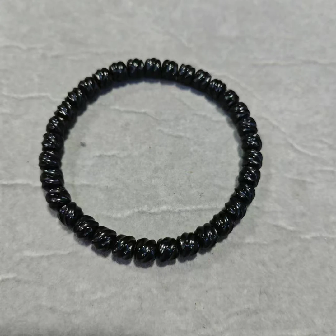 尺寸8*7mm左右椰蒂雕刻扭扭珠单圈一条《小鱼文玩》PJ061