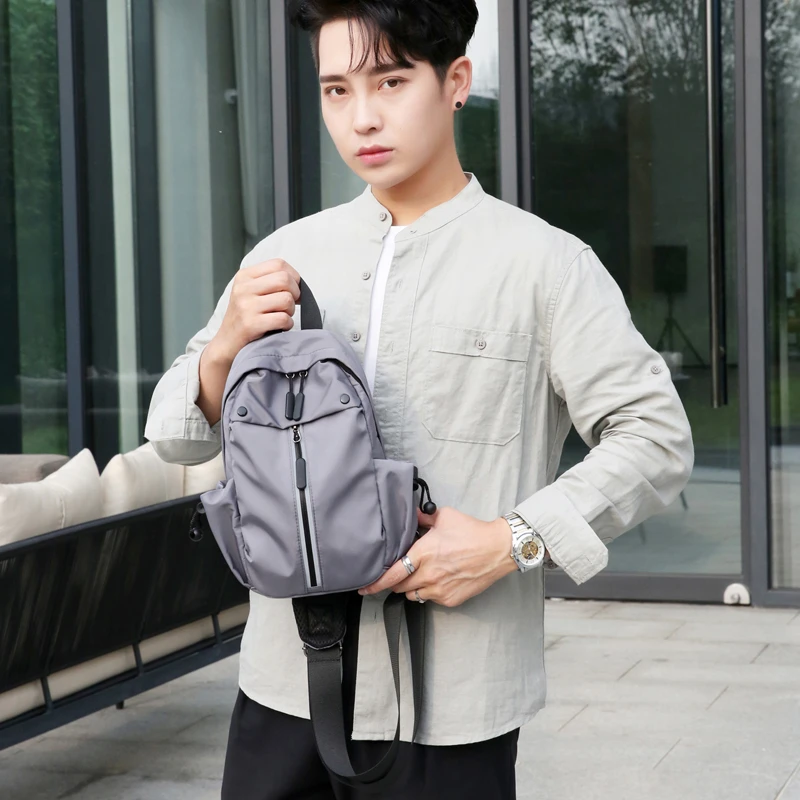 单肩斜挎包男士反光拉链潮流学院风运动韩版轻便胸前包单肩包男包