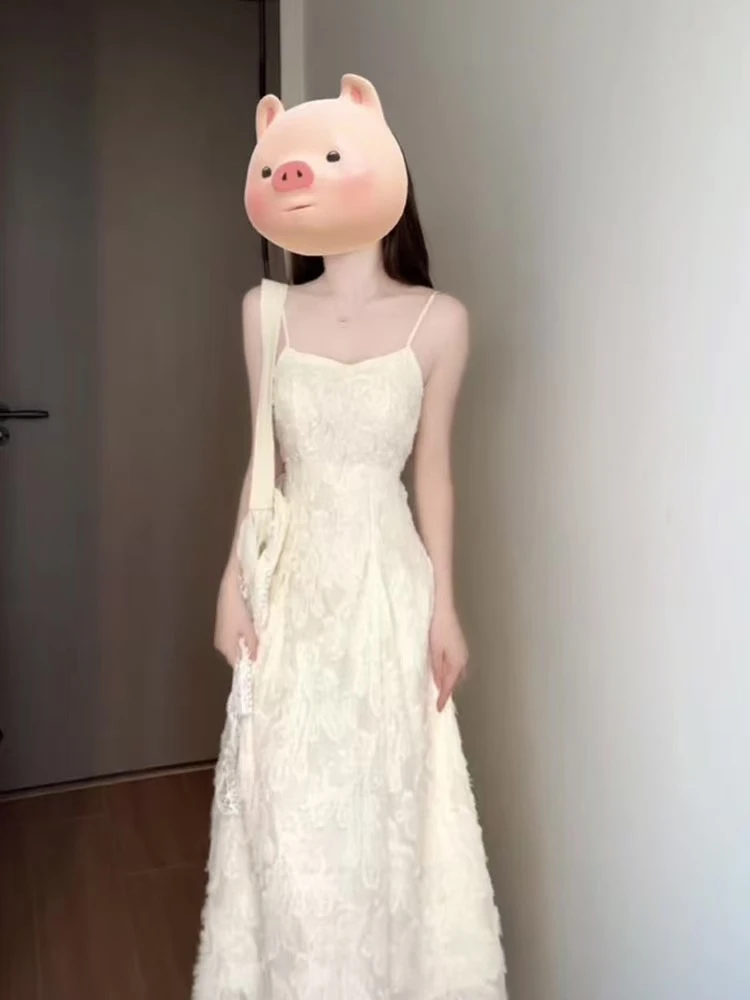 Z温柔甜美蕾丝提花吊带连衣裙夏季2025新款收腰显瘦气质长裙