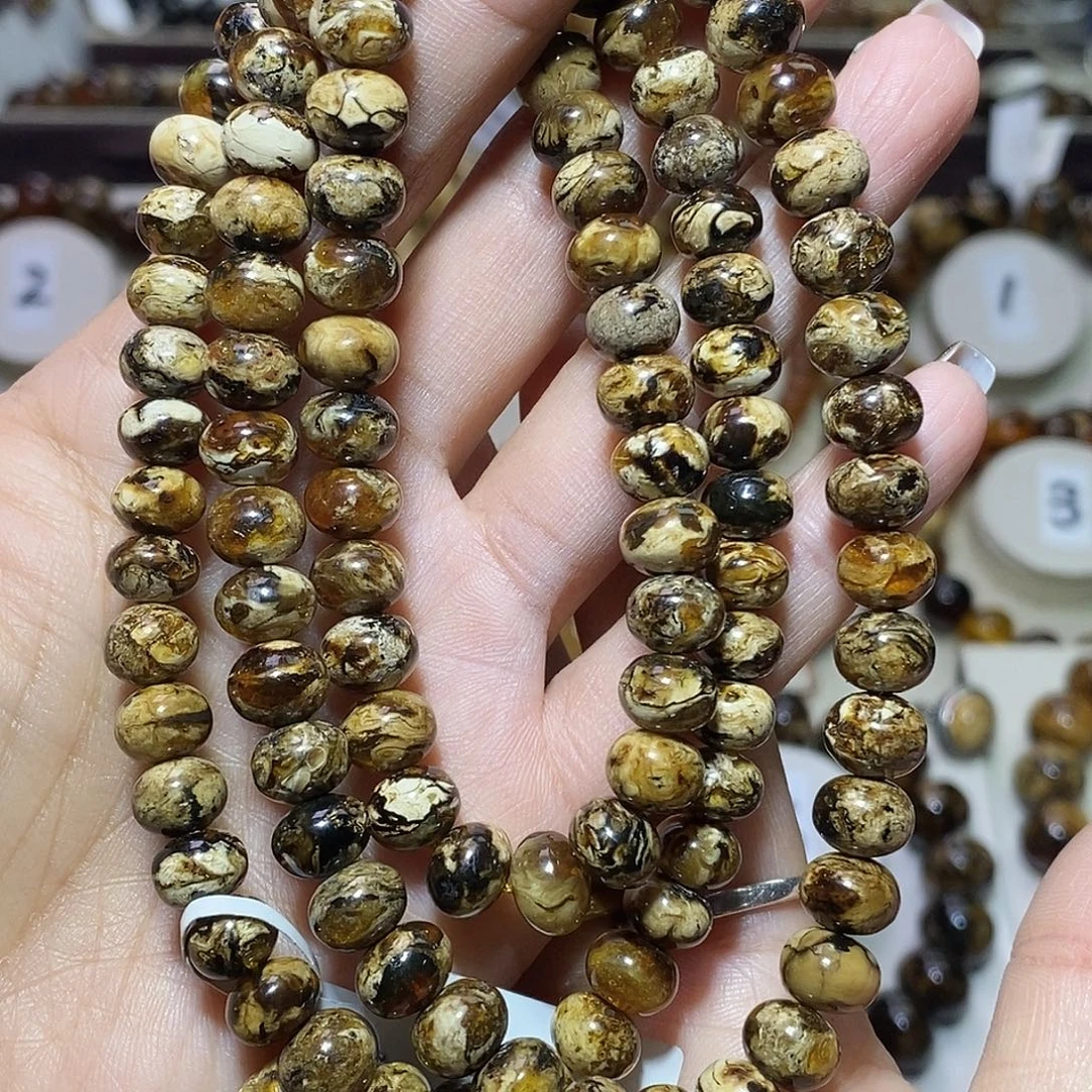 騳***鵀琥珀未镶嵌裸石白花珀8+