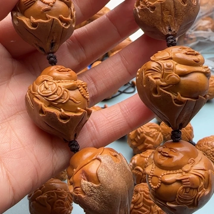 橄榄核手串过*雕刻工艺