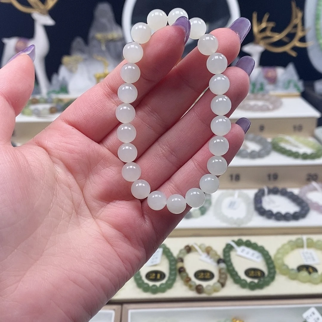 未镶嵌手链和田玉浮**记