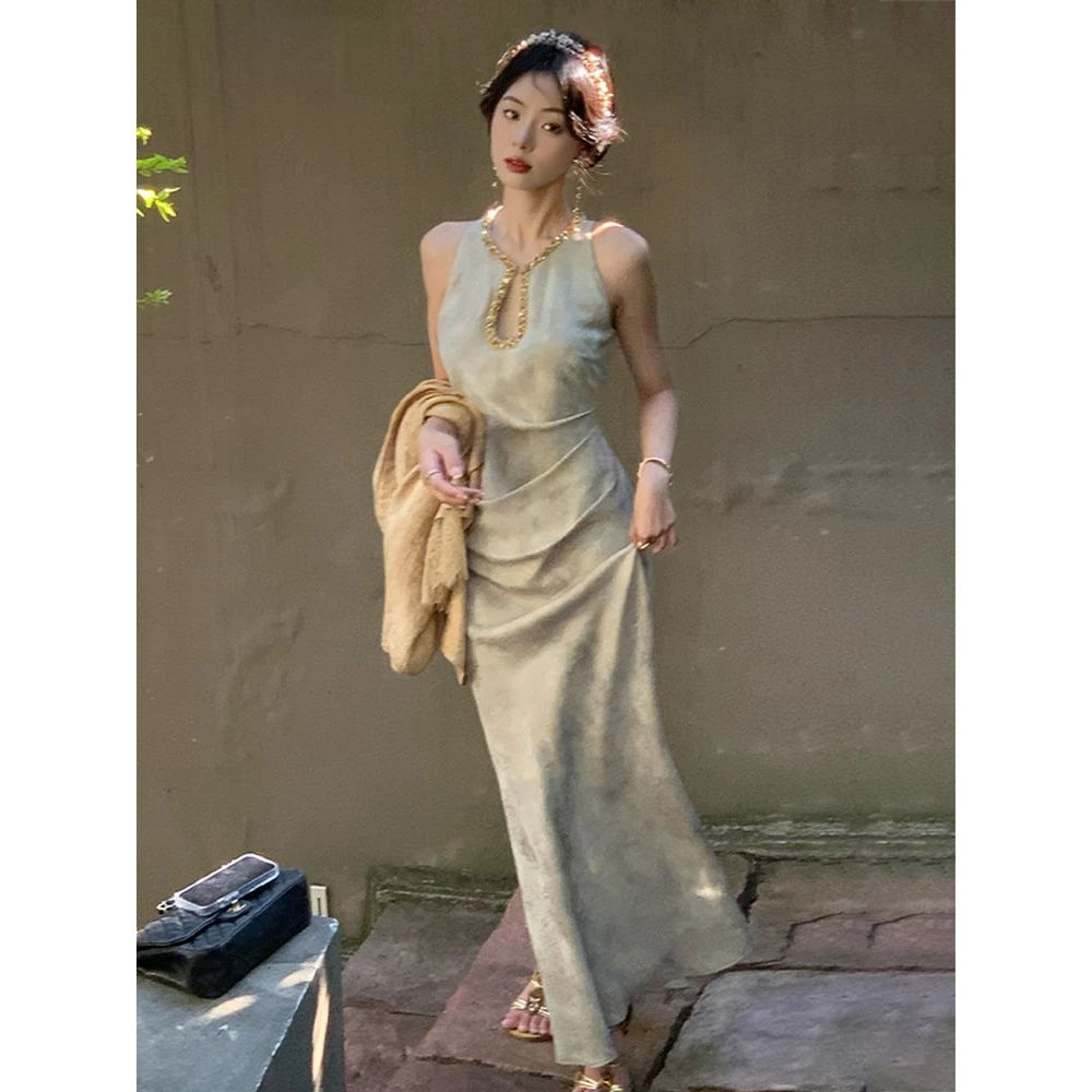 2025年夏季新款女装成熟连衣裙遮肉长裙镂空无袖绿色紧身包臀裙子