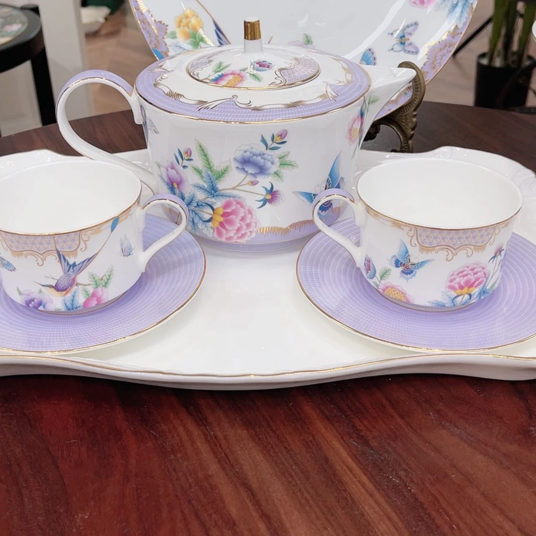 【闪购商品】瓷片一壶4杯碟———————