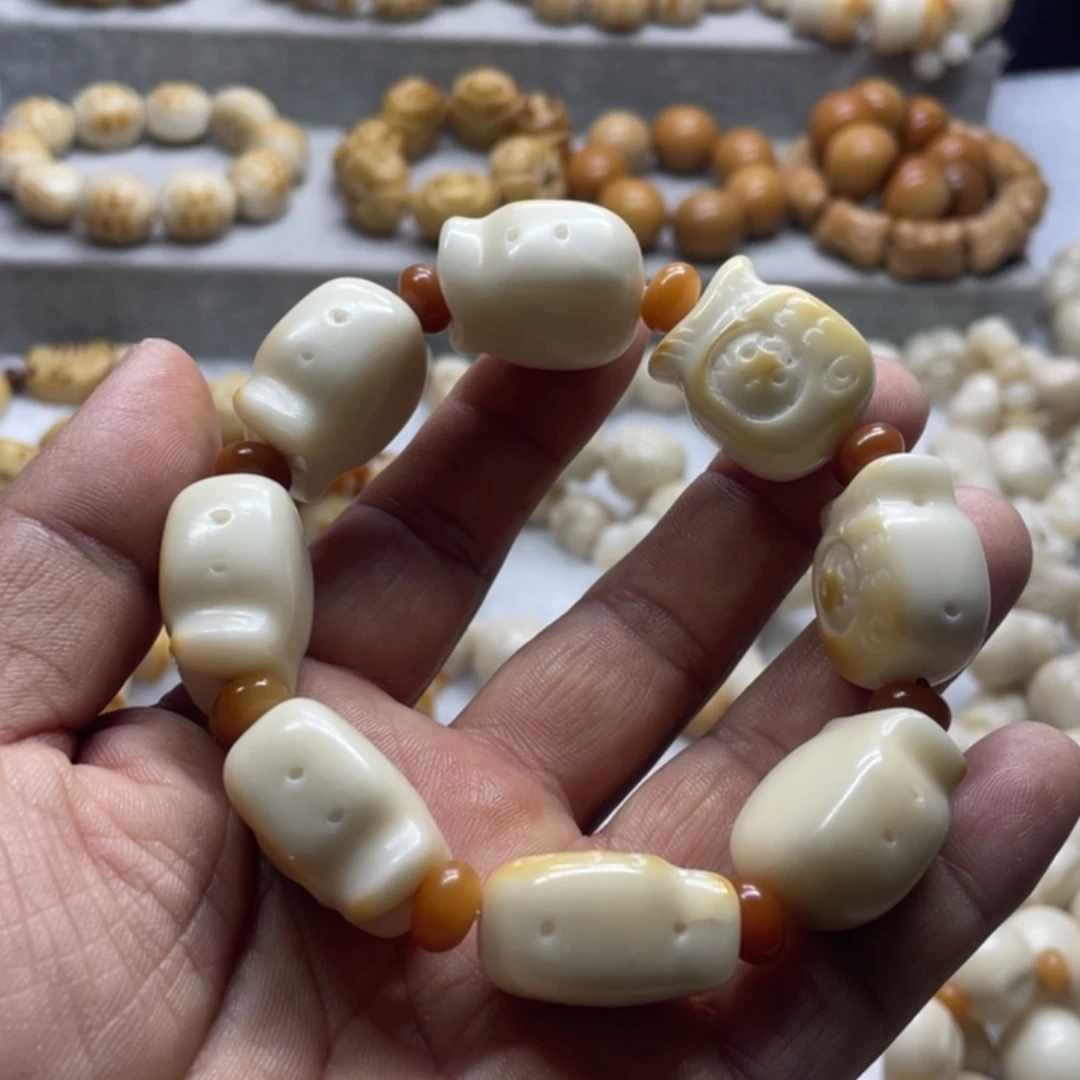 菩提根/象牙果吊坠微瑕象牙果鱼猫手串