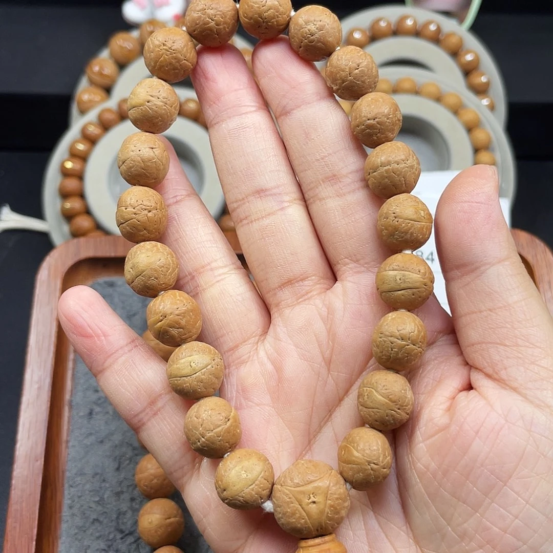 蒂***娜凤眼菩提手串L286-K10凤眼菩提12+同树黄皮