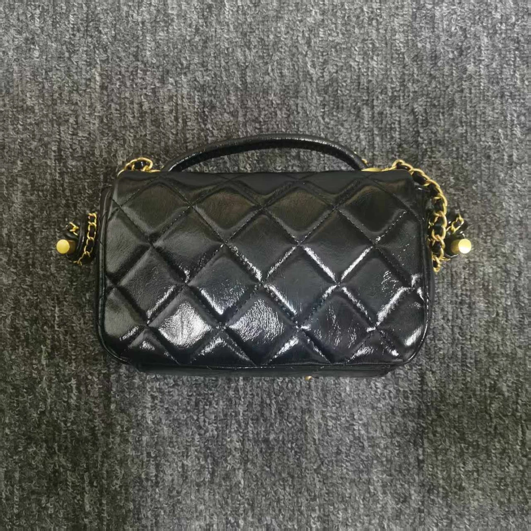 姝宴真皮女包链条手提黑色