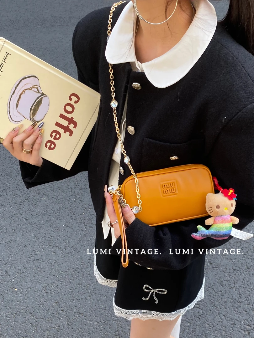 95新 MIU MIU/缪缪 南瓜色光面羊皮手拿包 73339251