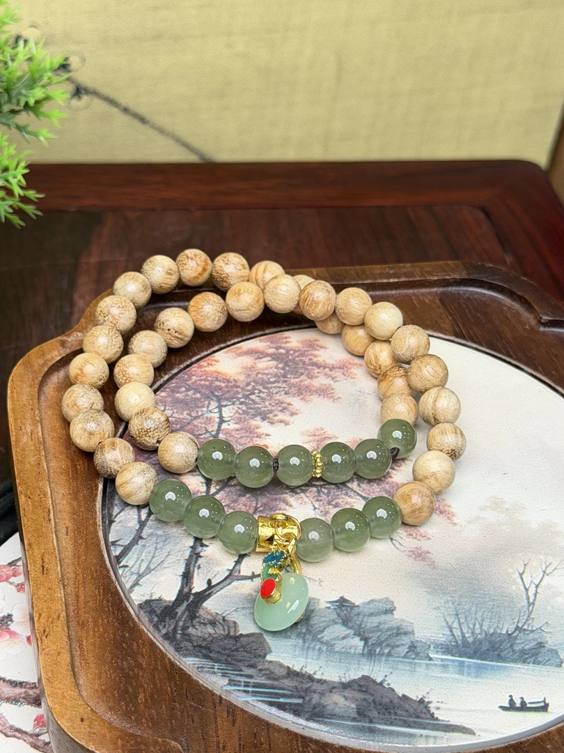 DA1139-0.6檀香木绿琉璃带平安扣