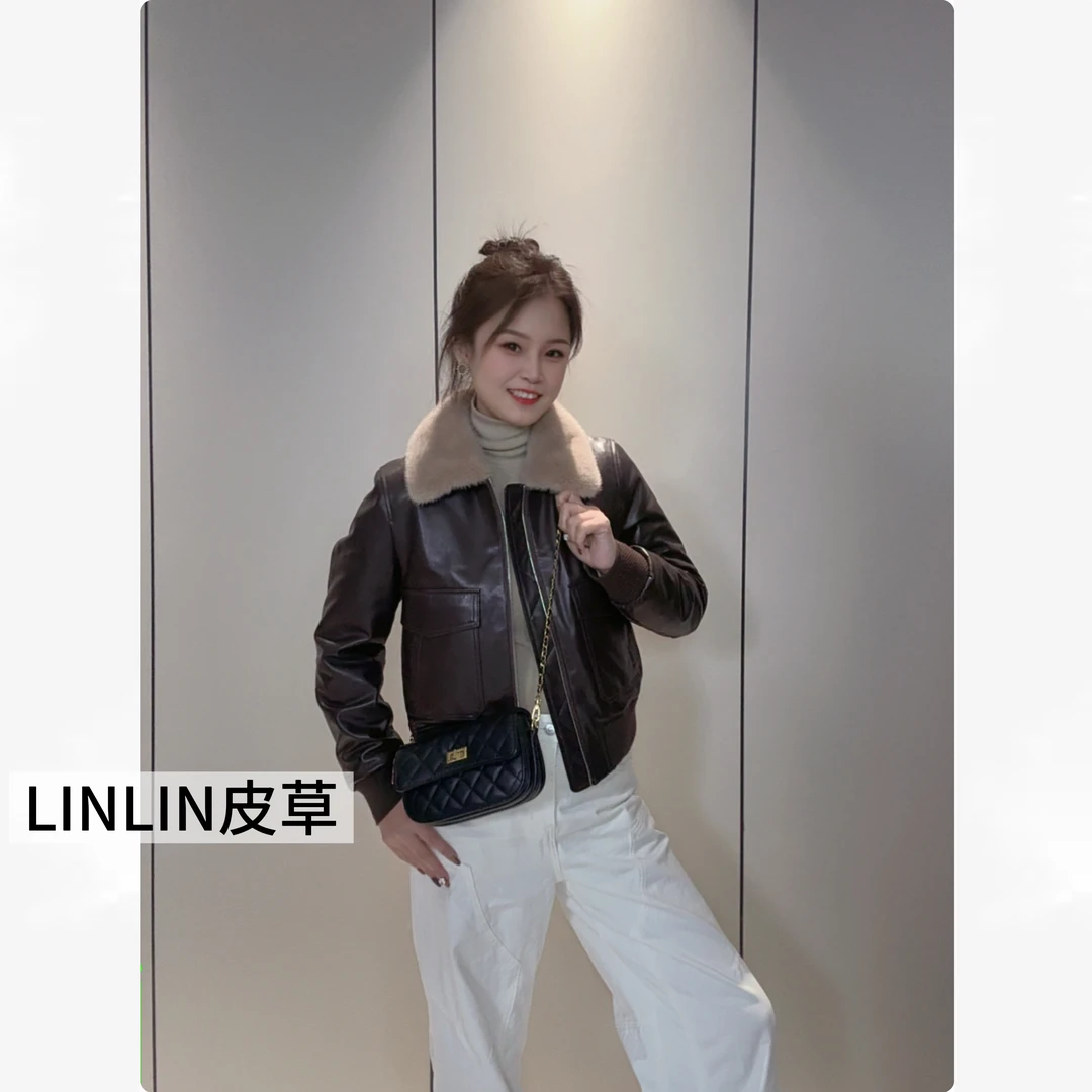 新款秋冬女款真皮羊皮鹅绒皮羽绒水貂毛领真皮皮衣中短款翻领。