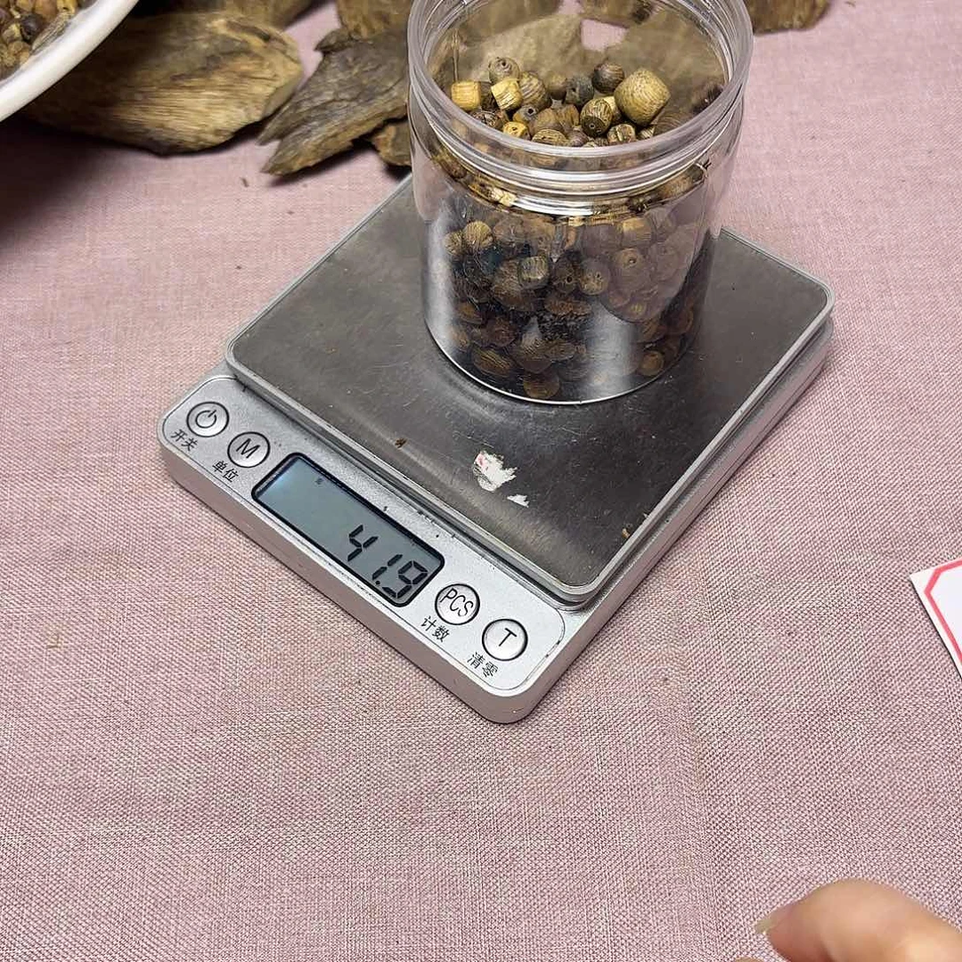 山***泉木奇楠瑕疵散珠40克