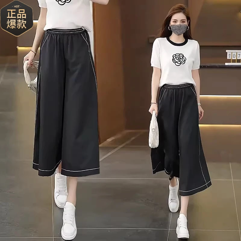 黑色冰丝薄款八分裙裤女2025夏季新款休闲垂感松紧腰七分阔腿裤子