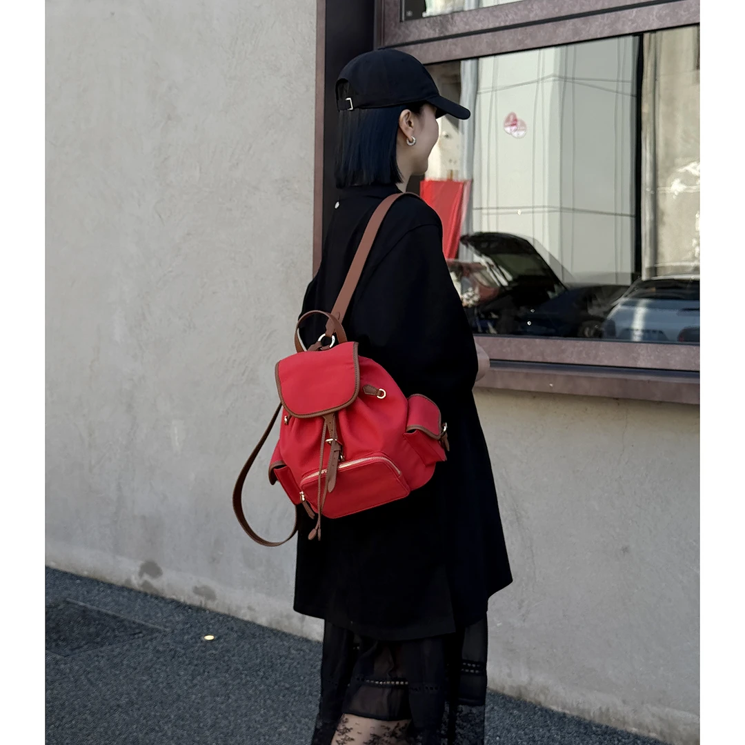 JISHE即奢贵版本牛仔棉帆布超百搭减龄牛仔拼皮手提背包AL5039