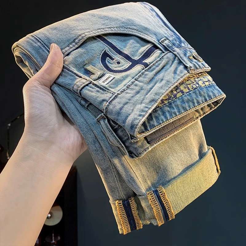 臣吾夏季薄款男士牛仔裤潮流浅蓝色砂洗高端休闲男裤子宽松锥形