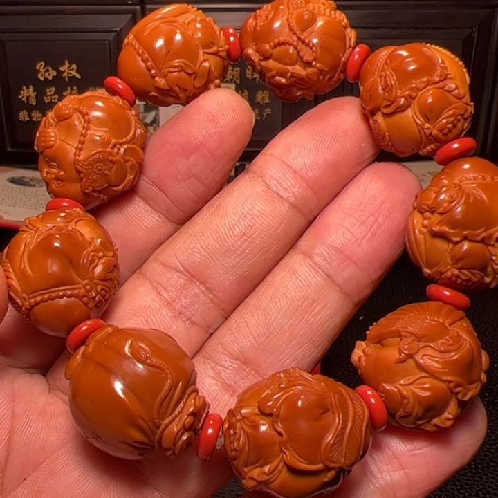 孤***客手串橄榄核八宝弥勒