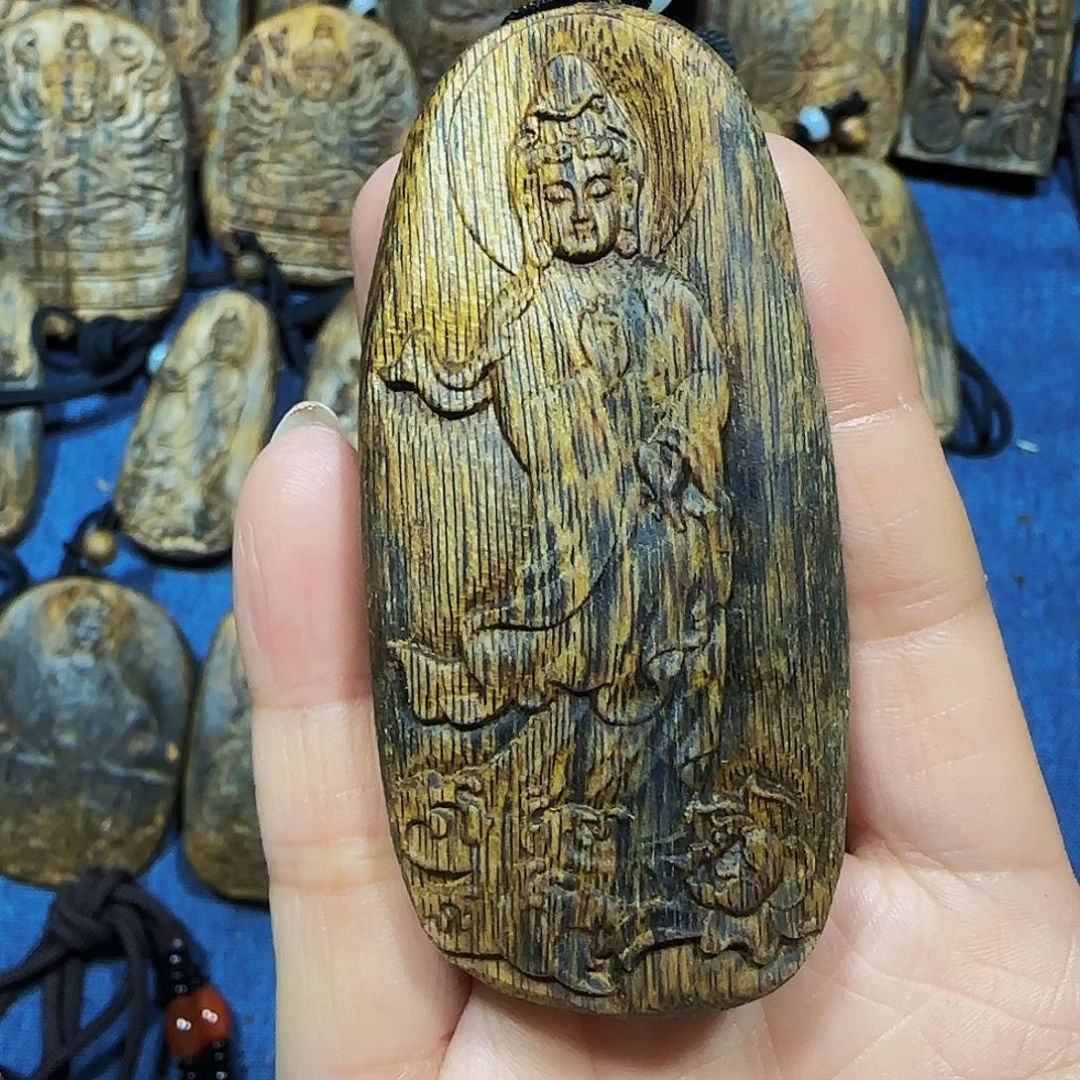 沉香沉香碎屑海南白奇乌身观音带绳17克