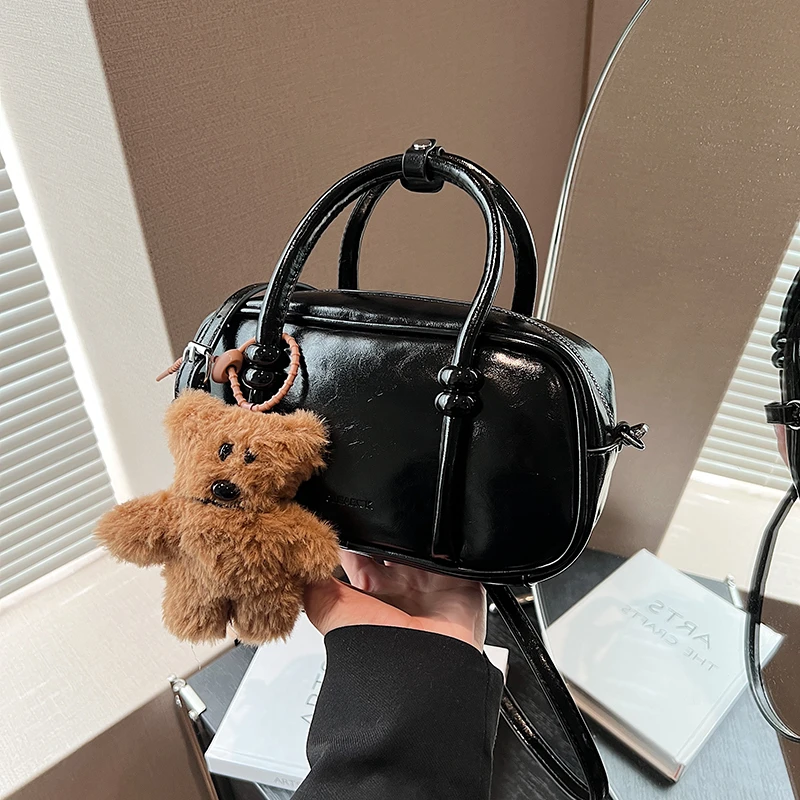 复古小众手提保龄球包包女2025秋季新款韩版枕头包简约纯色斜挎包