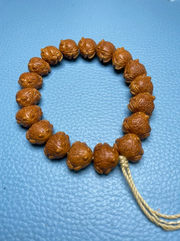 桃核雕刻呱呱来财文玩串