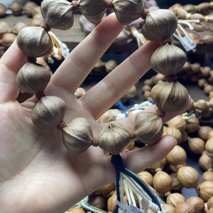 若***欢手串/手链橄榄核四花23*22