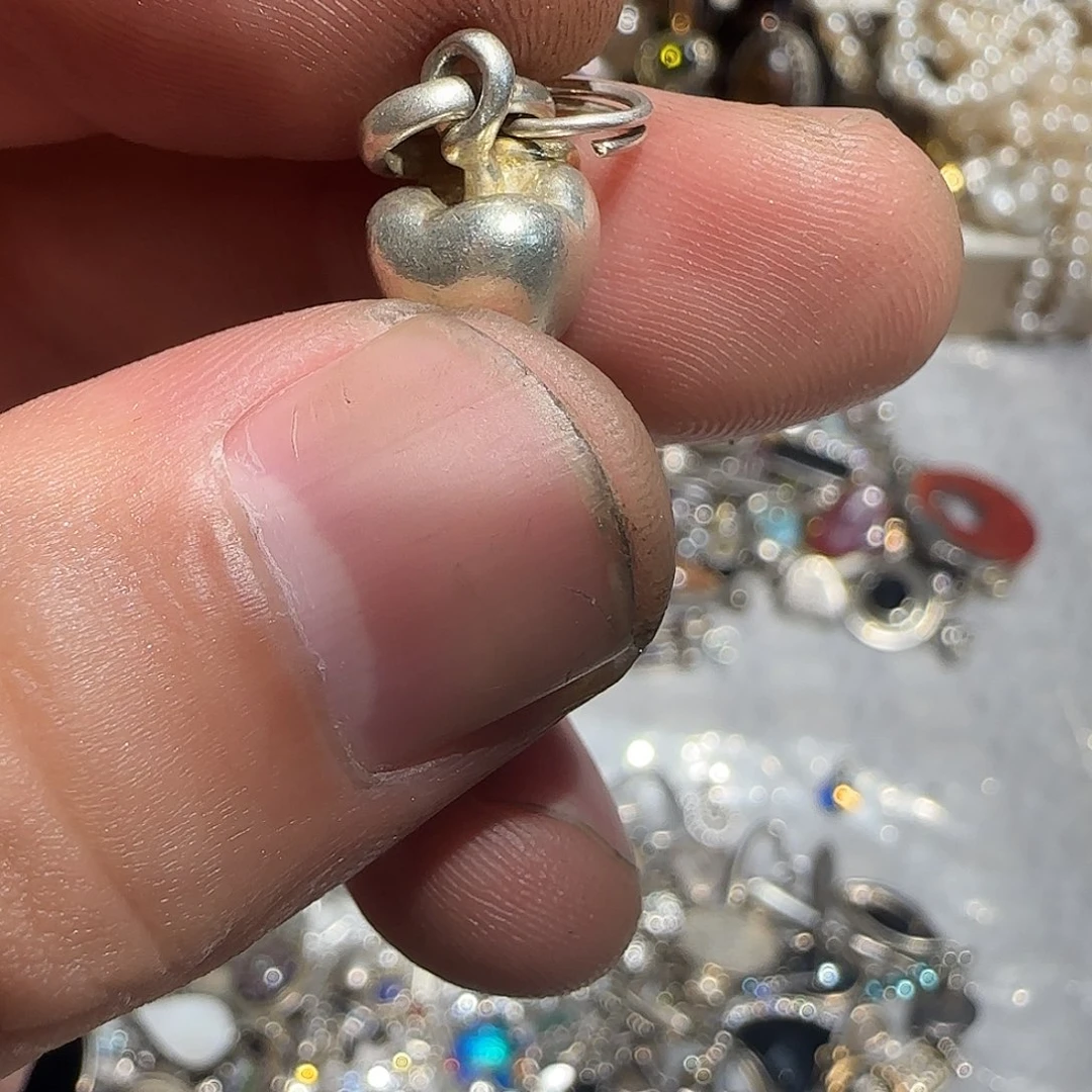 用***9大理石纯铜吊坠的设计也