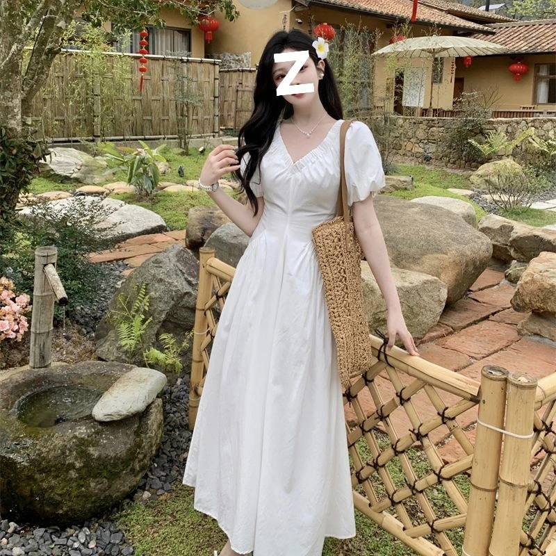 白色浪漫领收腰连衣裙夏季新款甜美气质泡泡袖长款小众设计感裙