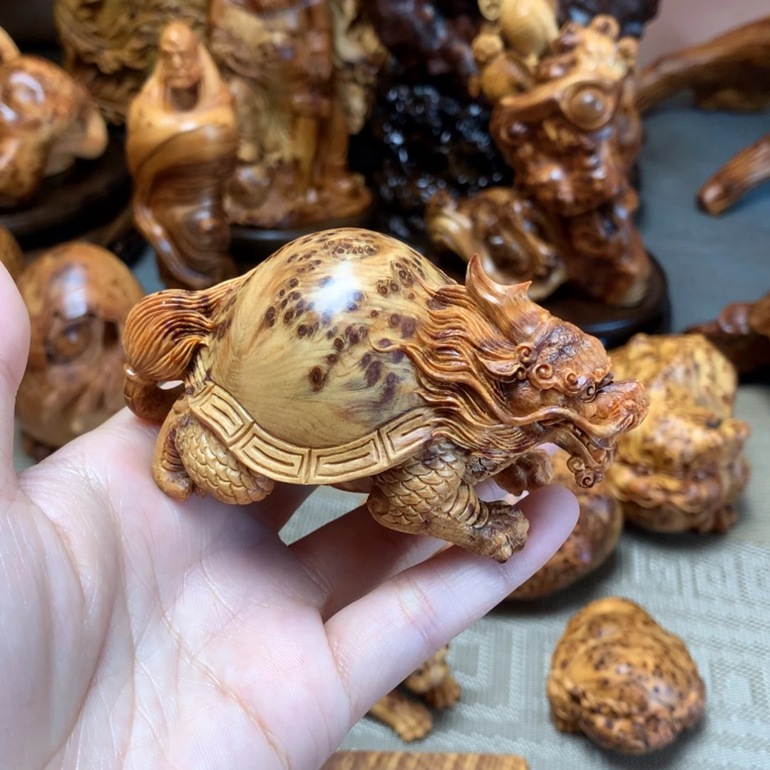 翰***情柏木（崖柏）精雕龙龟手把件