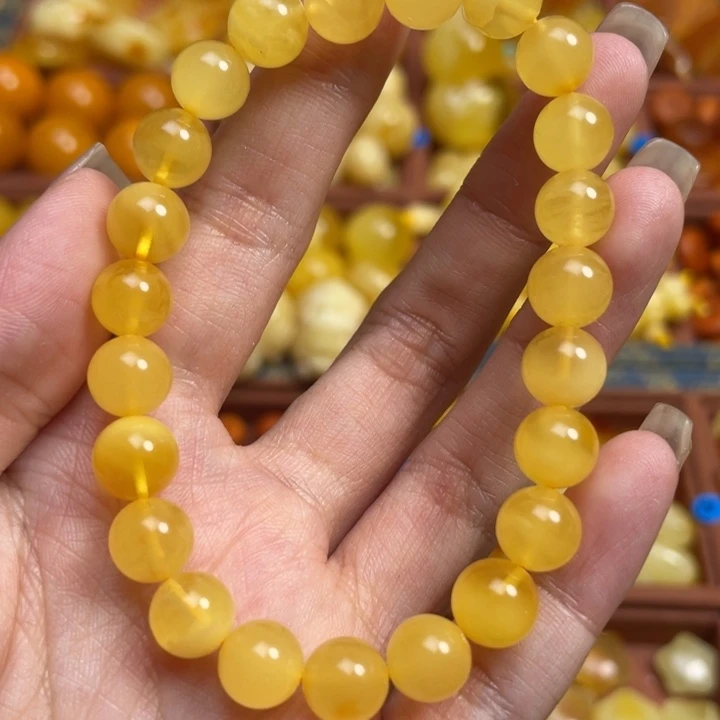 蜜蜡未镶嵌珠宝奇石满蜡妖花圆珠手串微微瑕