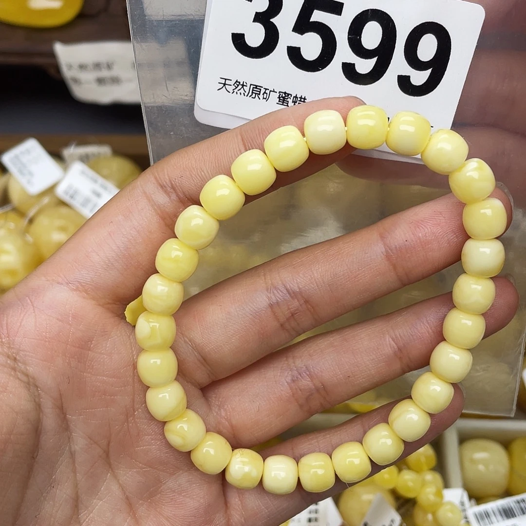 何***.蜜蜡未镶嵌珠宝奇石7+单圈