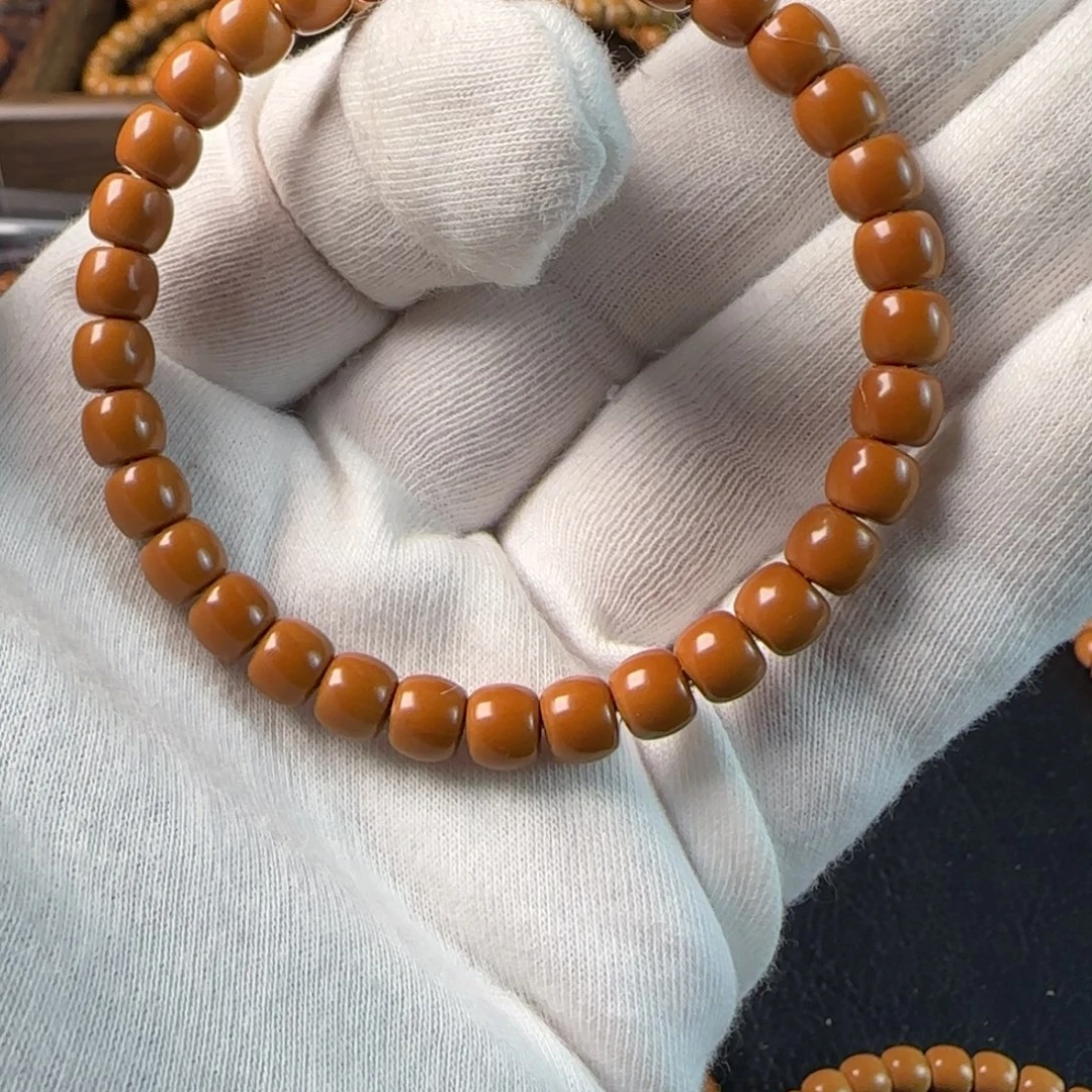 天****橄榄核手串老挝核尖单圈6.7mm全品三花料