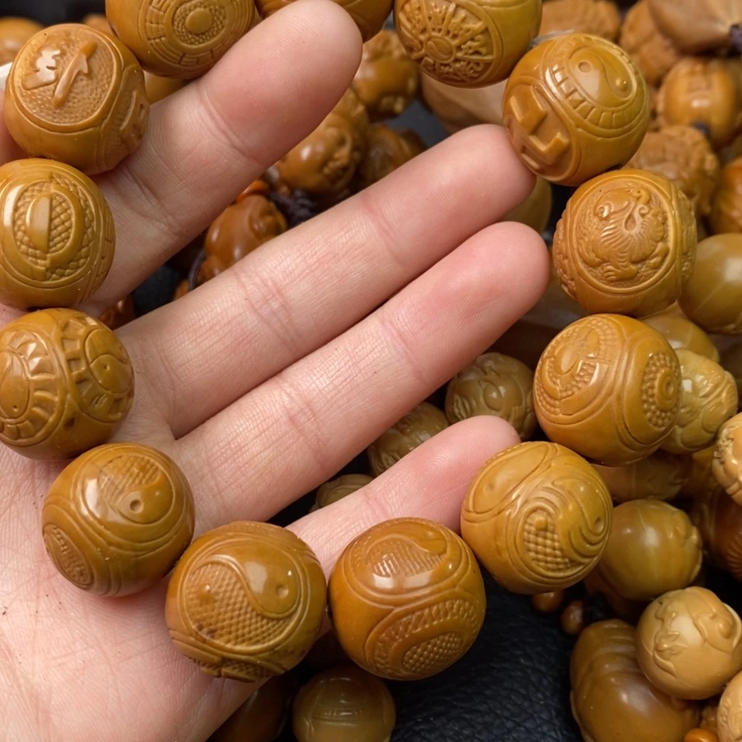 橄榄核吊坠万****8橄榄核泛油八卦