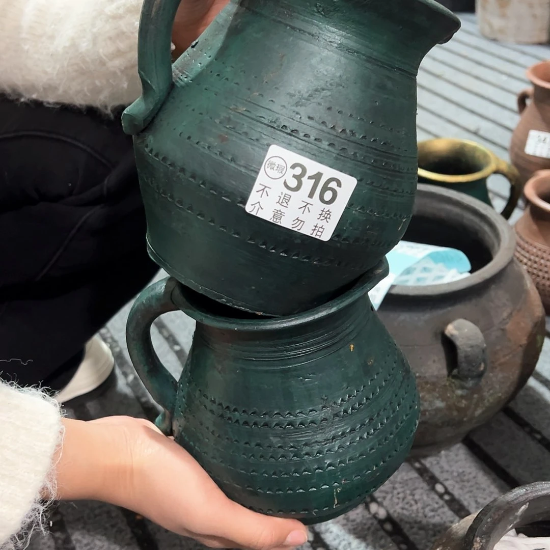红陶瑕疵绿壶一对316