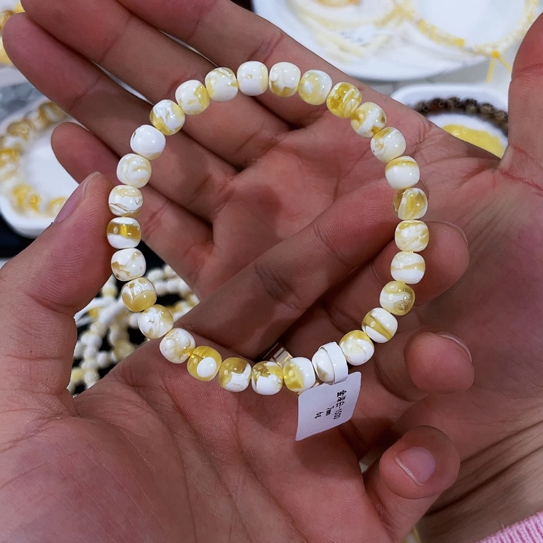 奔***奔琥珀未镶嵌手链金漆白溶洞7m