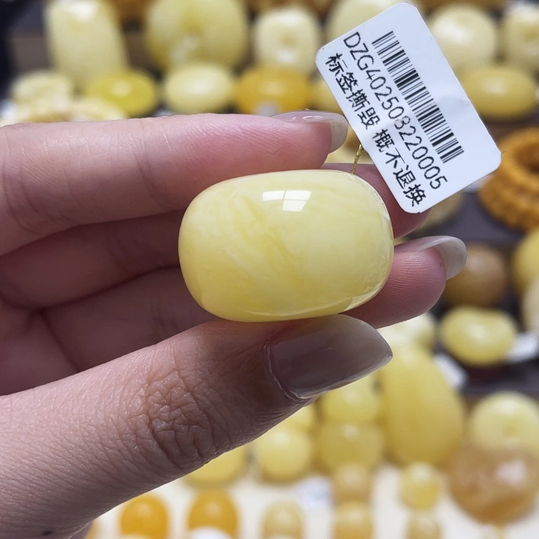 琥珀未镶嵌裸石26*16.9mm浓蜡虎皮妖花扣子瑕