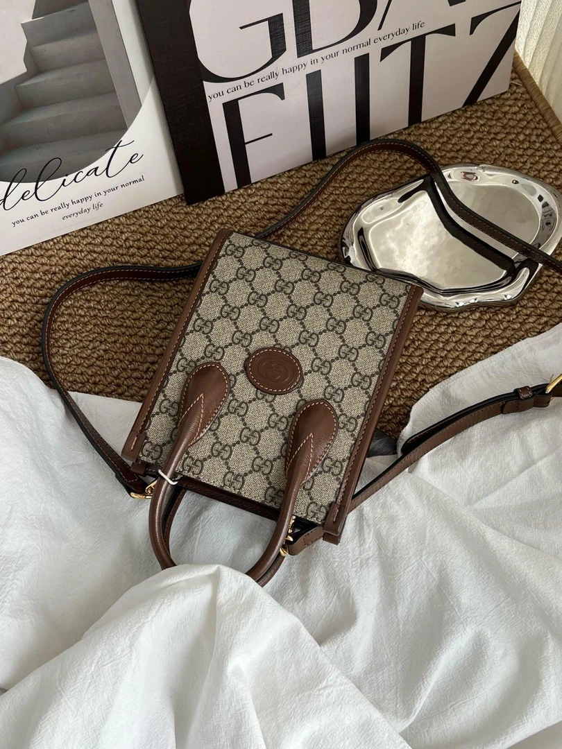 99新 GUCCI/古驰 3564 老花琴谱mini手提斜挎包