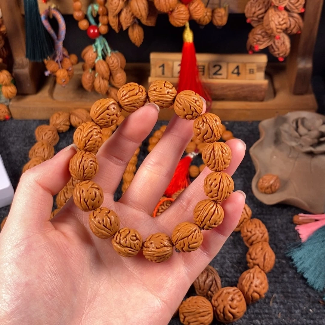吊坠桃核桃枭手串