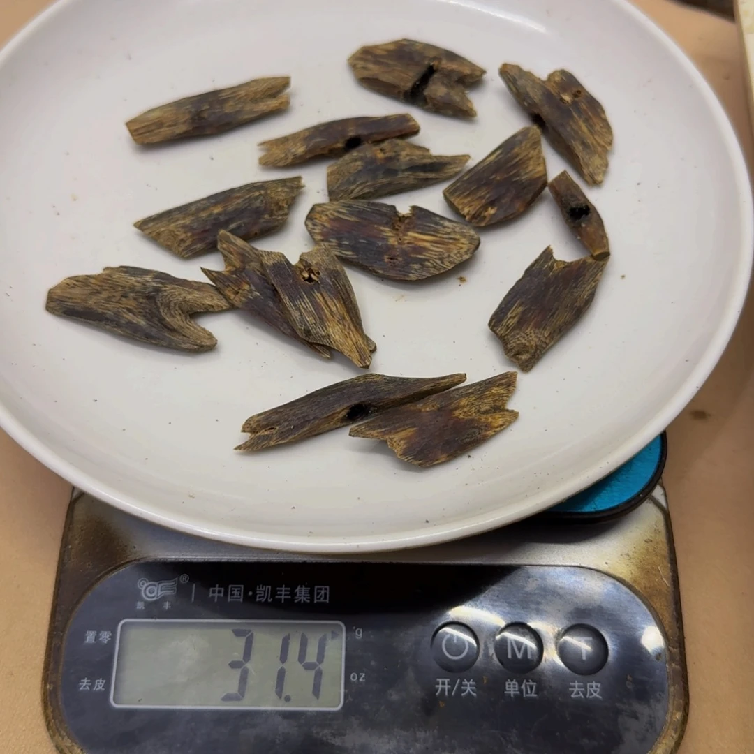 拉***姆沉香碎屑沉香汝湖高油块料31克
