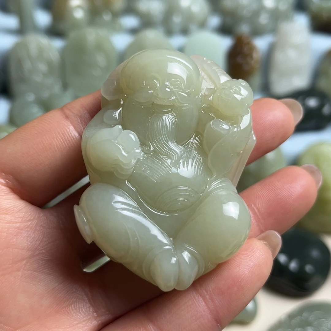 抖***歌和田玉未镶嵌把件