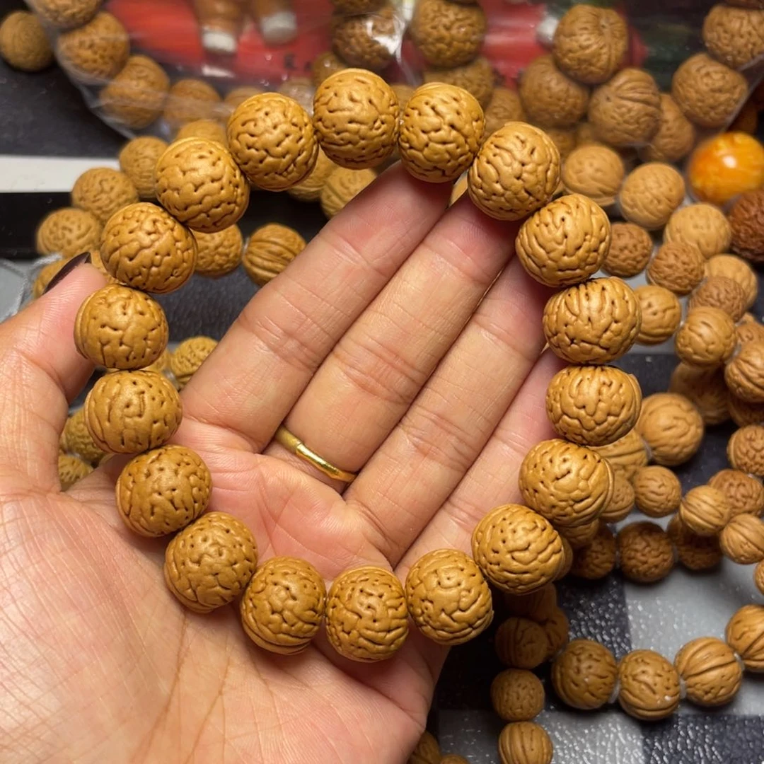 吊坠桃核16.6金丹手串